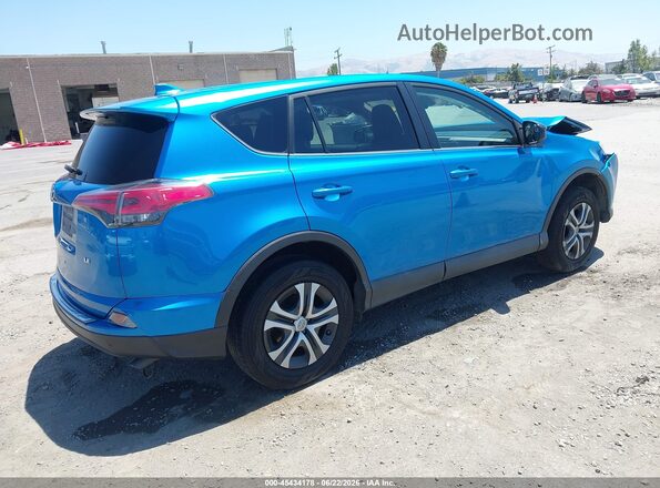2T3ZFREV3JW440306 2018 TOYOTA RAV4 Blue Rear right