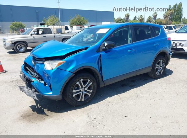 2T3ZFREV3JW440306 2018 TOYOTA RAV4 Blue Front left