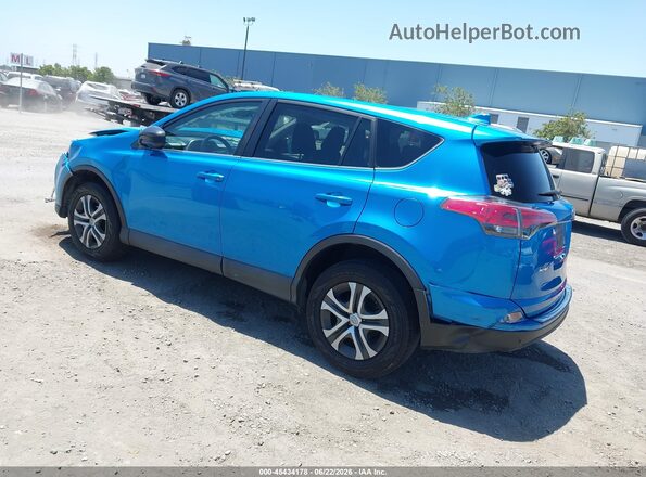 2T3ZFREV3JW440306 2018 TOYOTA RAV4 Blue Rear left
