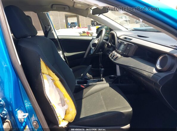 2T3ZFREV3JW440306 2018 TOYOTA RAV4 Blue Front interior view