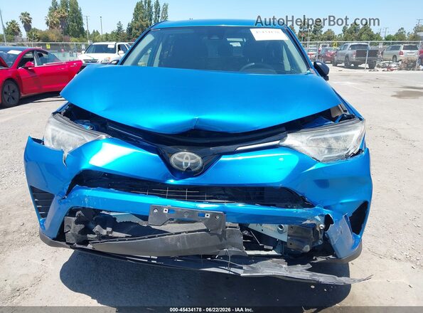 2T3ZFREV3JW440306 2018 TOYOTA RAV4 Blue Front view