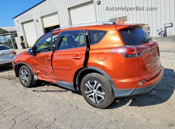 2T3ZFREV4GW290344 2016 TOYOTA RAV4 Orange Rear left