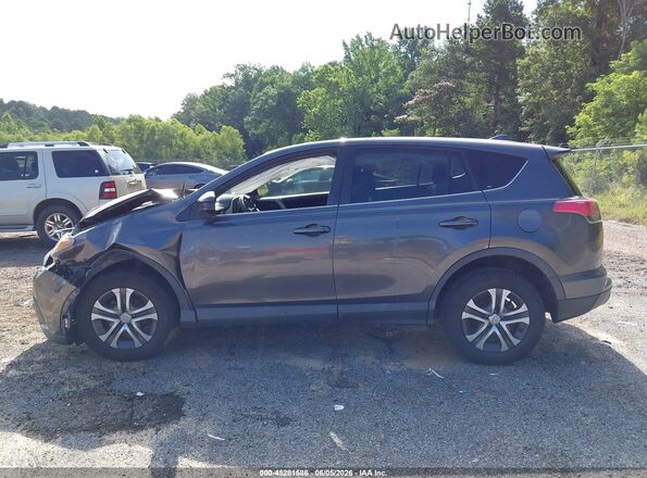 2T3ZFREV4JW459558 2018 TOYOTA RAV4 Gray 