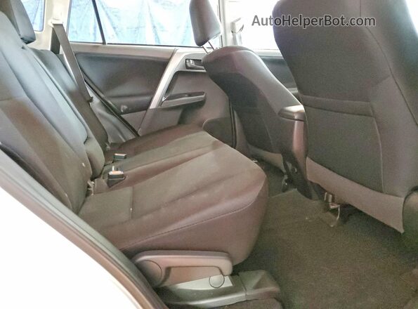 2T3ZFREV4JW489997 2018 TOYOTA RAV White Rear interior view