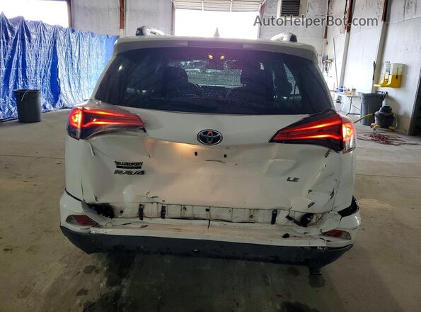 2T3ZFREV4JW489997 2018 TOYOTA RAV White Rear view