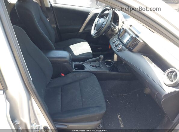2T3ZFREV5GW240391 2016 TOYOTA RAV4 Blue წინა სალონის ხედი