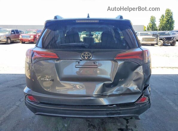 2T3ZFREV5GW271401 2016 TOYOTA RAV4 Gray Rear view