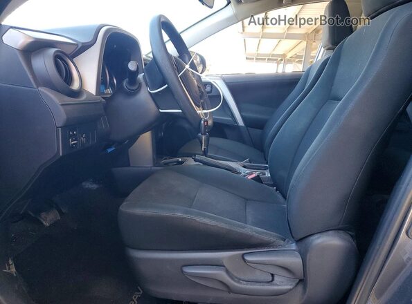2T3ZFREV5GW271401 2016 TOYOTA RAV4 Gray Front interior view