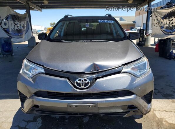 2T3ZFREV5GW271401 2016 TOYOTA RAV4 Gray Front view