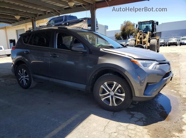 2T3ZFREV5GW271401 2016 TOYOTA RAV4 Gray Front right