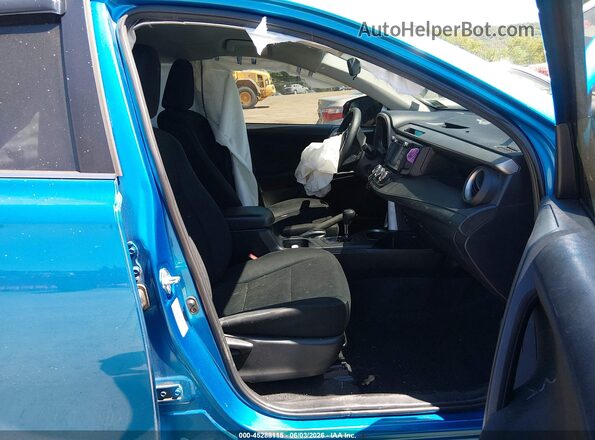 2T3ZFREV6GW272542 2016 TOYOTA RAV4 Blue Вид салону спереду