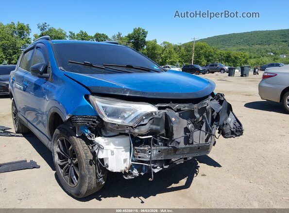 2T3ZFREV6GW272542 2016 TOYOTA RAV4 Blue 
