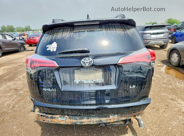 2T3ZFREV6GW310173 2016 TOYOTA RAV4 Black Rear view