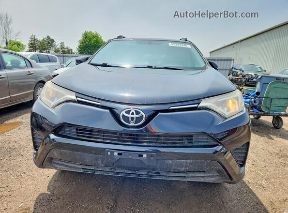 2T3ZFREV6GW310173 2016 TOYOTA RAV4 Black Front view