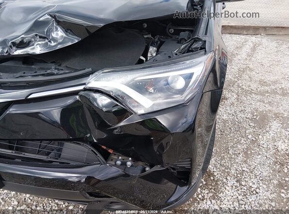 2T3ZFREV6JW460162 2018 TOYOTA RAV4 Black Widok wnętrza z przodu