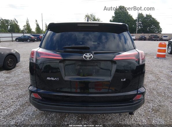 2T3ZFREV6JW460162 2018 TOYOTA RAV4 Black Widok wnętrza z tyłu