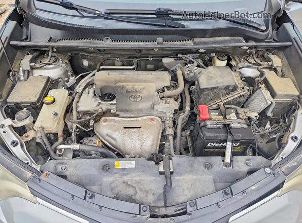 2T3ZFREV7GW257371 2016 TOYOTA RAV4 Silver Widok wnętrza z tyłu