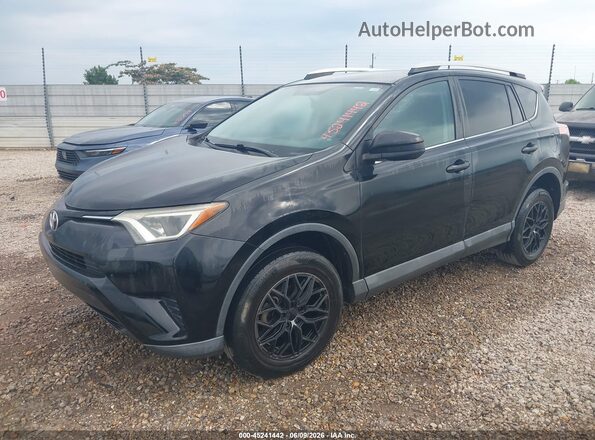 2T3ZFREV7GW268841 2016 TOYOTA RAV4 Black 