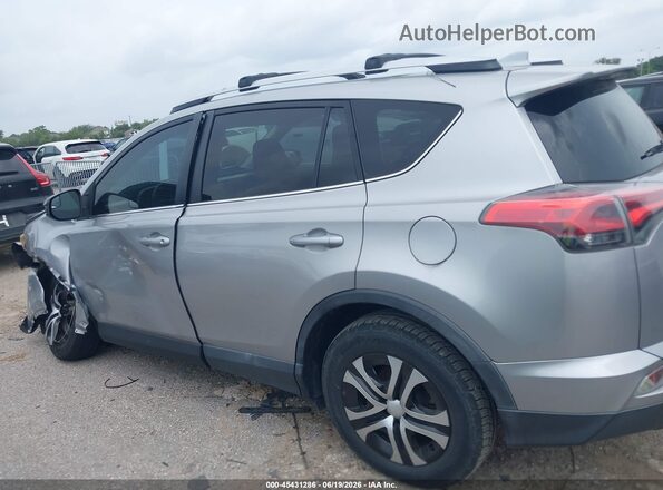 2T3ZFREV7GW306326 2016 TOYOTA RAV4 Silver 