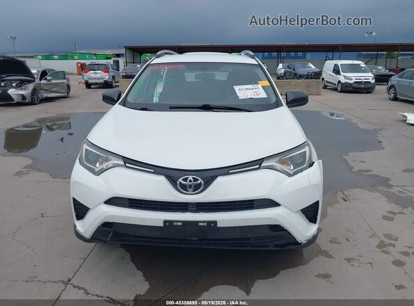 2T3ZFREV7GW309534 2016 TOYOTA RAV4 White უკანა სალონის ხედი