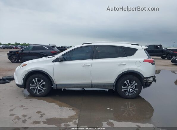 2T3ZFREV7GW309534 2016 TOYOTA RAV4 White 
