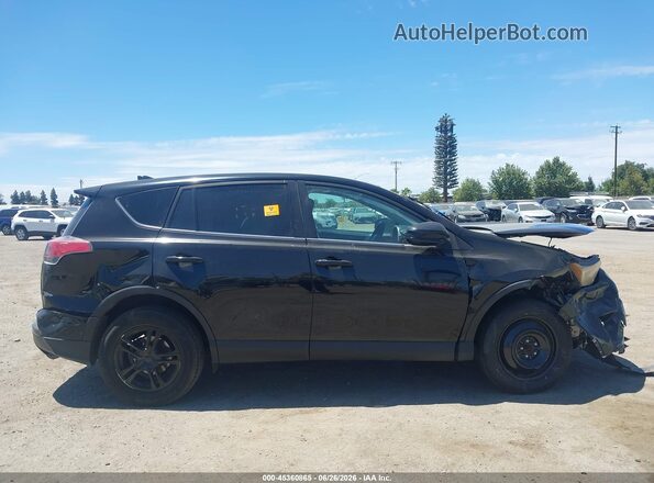 2T3ZFREV7HW382937 2017 TOYOTA RAV4 Black Вид задньої частини салону