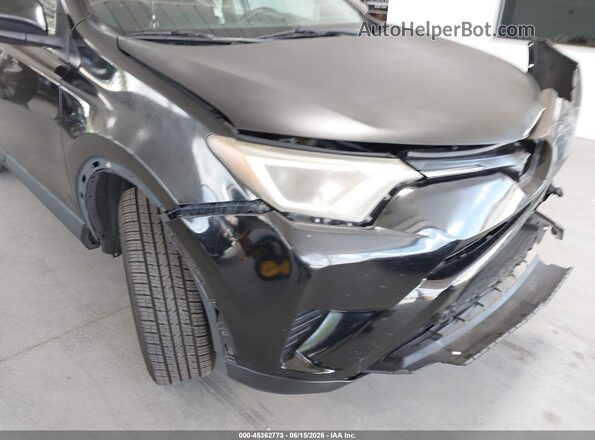 2T3ZFREV7JW476340 2018 TOYOTA RAV4 Black Front view