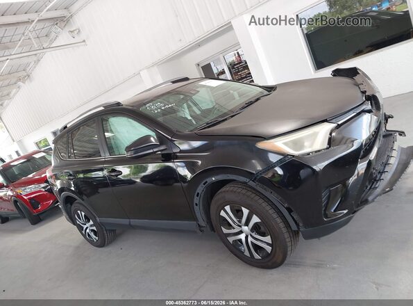 2T3ZFREV7JW476340 2018 TOYOTA RAV4 Black Rear interior view