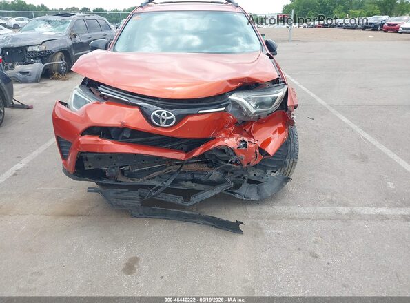 2T3ZFREV8GW292694 2016 TOYOTA RAV4 Orange Front view