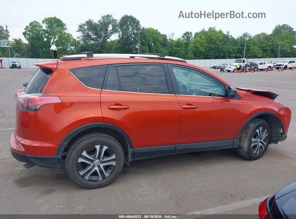 2T3ZFREV8GW292694 2016 TOYOTA RAV4 Orange Rear interior view