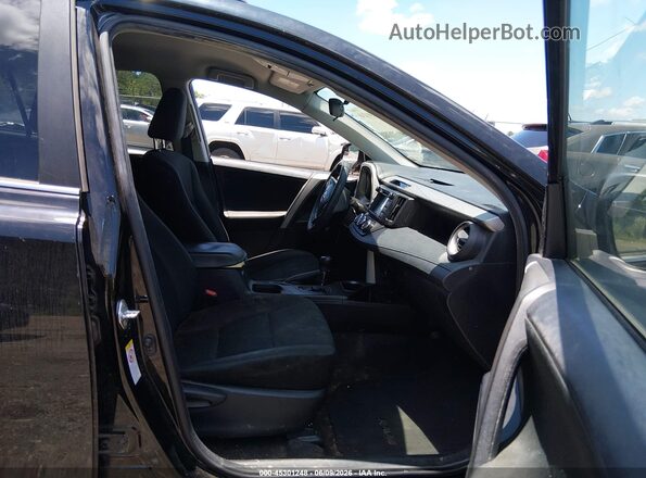 2T3ZFREV8JW417698 2018 TOYOTA RAV4 Черный Вид салона спереди