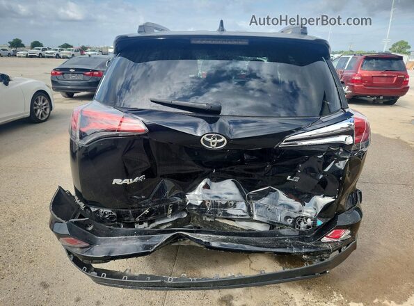 2T3ZFREV8JW422285 2018 TOYOTA RAV4 Black Вид ззаду