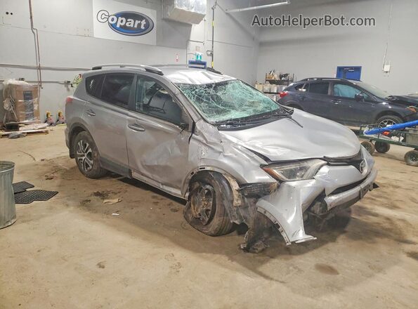 2T3ZFREV9GW264726 2016 TOYOTA RAV4 Серебряный 