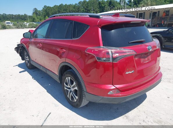 2T3ZFREV9HW335831 2017 TOYOTA RAV4 Burgundy Rear left