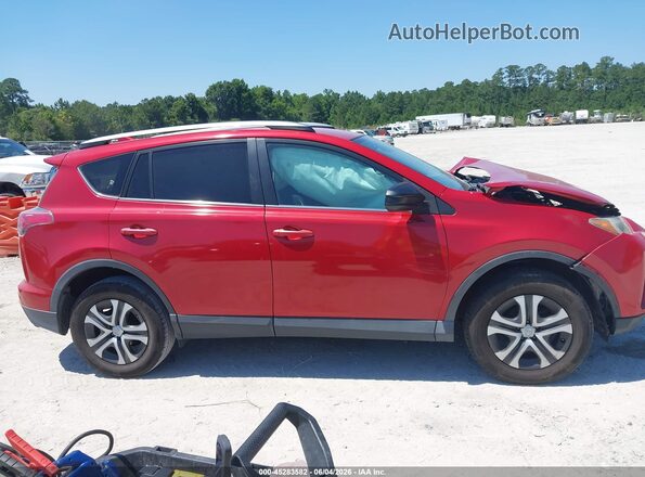 2T3ZFREV9HW335831 2017 TOYOTA RAV4 Burgundy Rear interior view