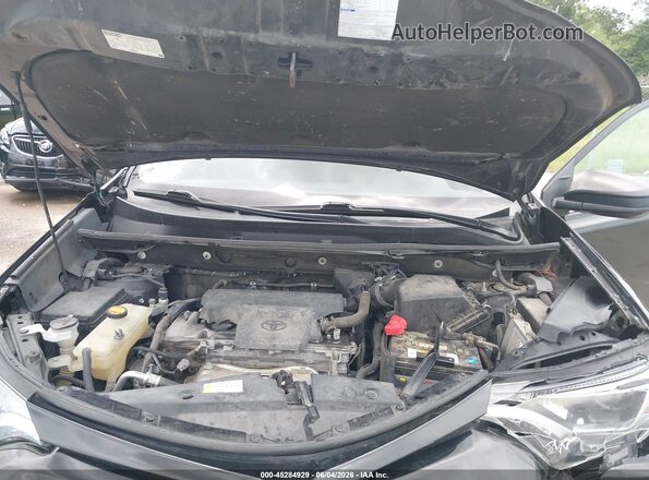 2T3ZFREV9JW455652 2018 TOYOTA RAV4 Black Rear view