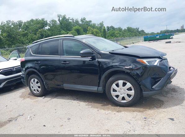 2T3ZFREV9JW455652 2018 TOYOTA RAV4 Black Rear interior view