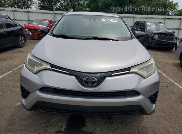 2T3ZFREV9JW499991 2018 TOYOTA RAV4 Серебряный Вид спереди