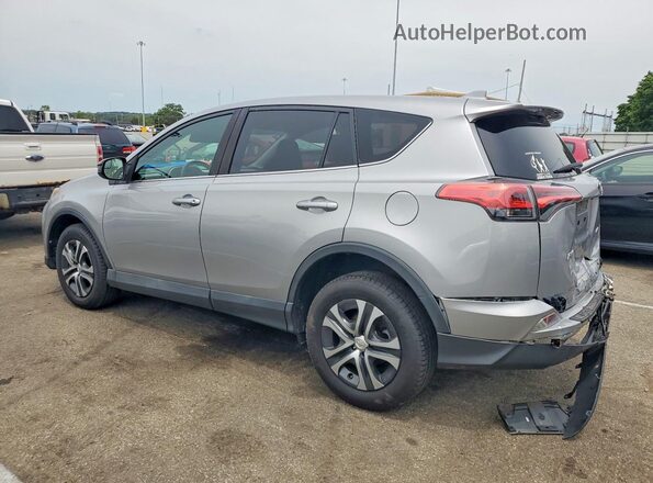 2T3ZFREV9JW499991 2018 TOYOTA RAV4 Серебряный Задняя левая четверть