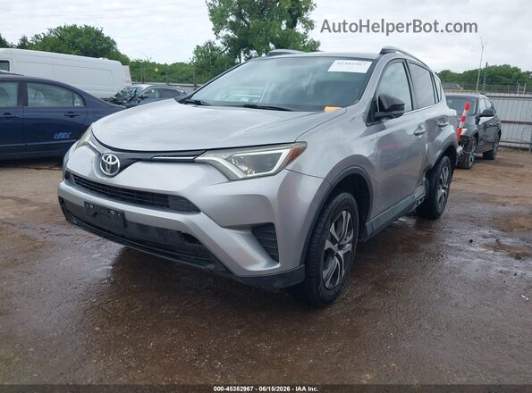 2T3ZFREVXGW309348 2016 TOYOTA RAV4 Silver Vista tres cuartos delantera izquierda