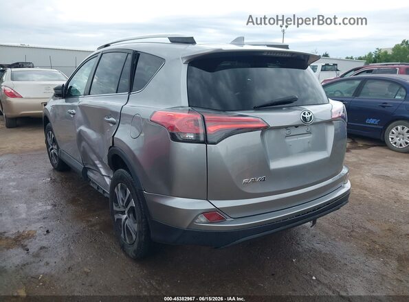 2T3ZFREVXGW309348 2016 TOYOTA RAV4 Silver Trasero izquierdo