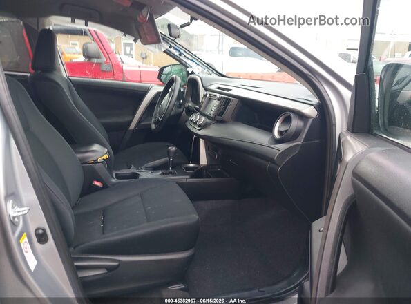 2T3ZFREVXGW309348 2016 TOYOTA RAV4 Silver Vista interior delantera