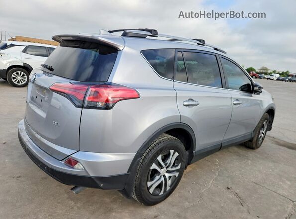 2T3ZFREVXHW405403 2017 TOYOTA RAV4 Silver Trasero derecho