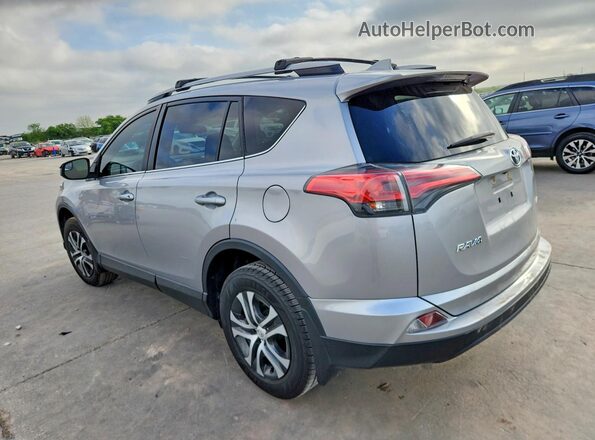 2T3ZFREVXHW405403 2017 TOYOTA RAV4 Silver Trasero izquierdo
