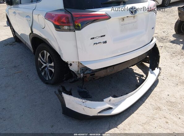 2T3ZFREVXJW477207 2018 TOYOTA RAV4 White Front view