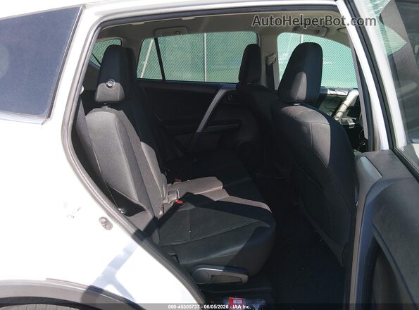 2T3ZFREVXJW477207 2018 TOYOTA RAV4 White VIN sticker view