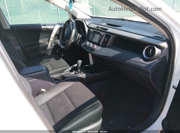 2T3ZFREVXJW477207 2018 TOYOTA RAV4 White Front interior view