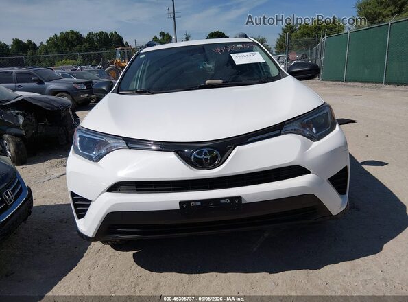 2T3ZFREVXJW477207 2018 TOYOTA RAV4 White Rear interior view