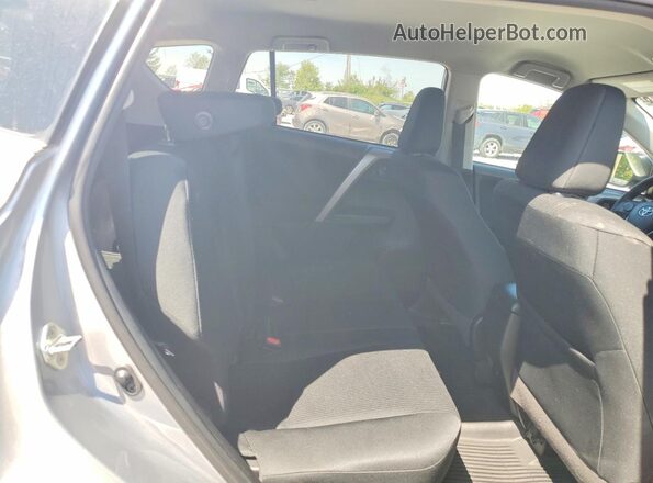 2T3ZFREVXJW519570 2018 TOYOTA RAV4 Silver Rear interior view