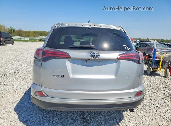 2T3ZFREVXJW519570 2018 TOYOTA RAV4 Silver Rear view